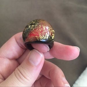 Red, black and gold glass ring